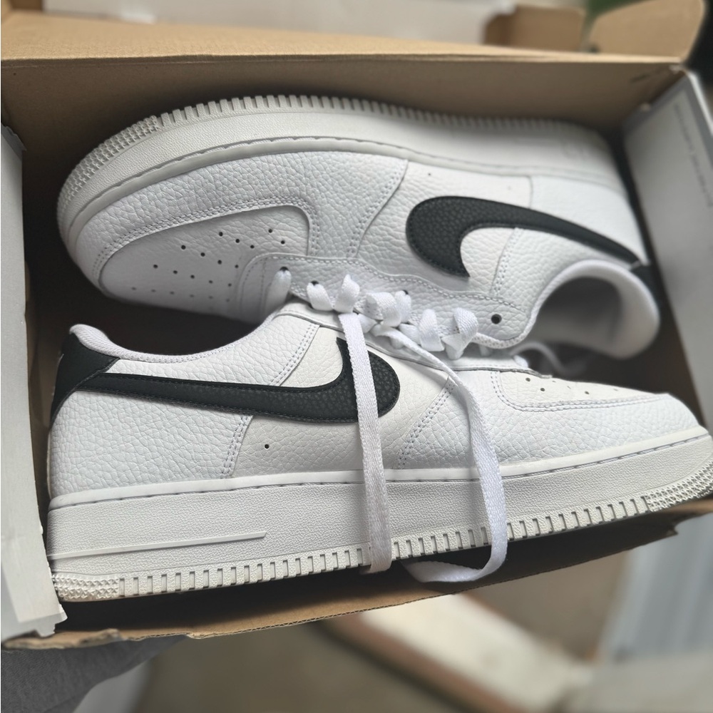 Air Force 1s with black swoosh
